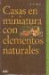 Casas en miniatura con elementos naturales